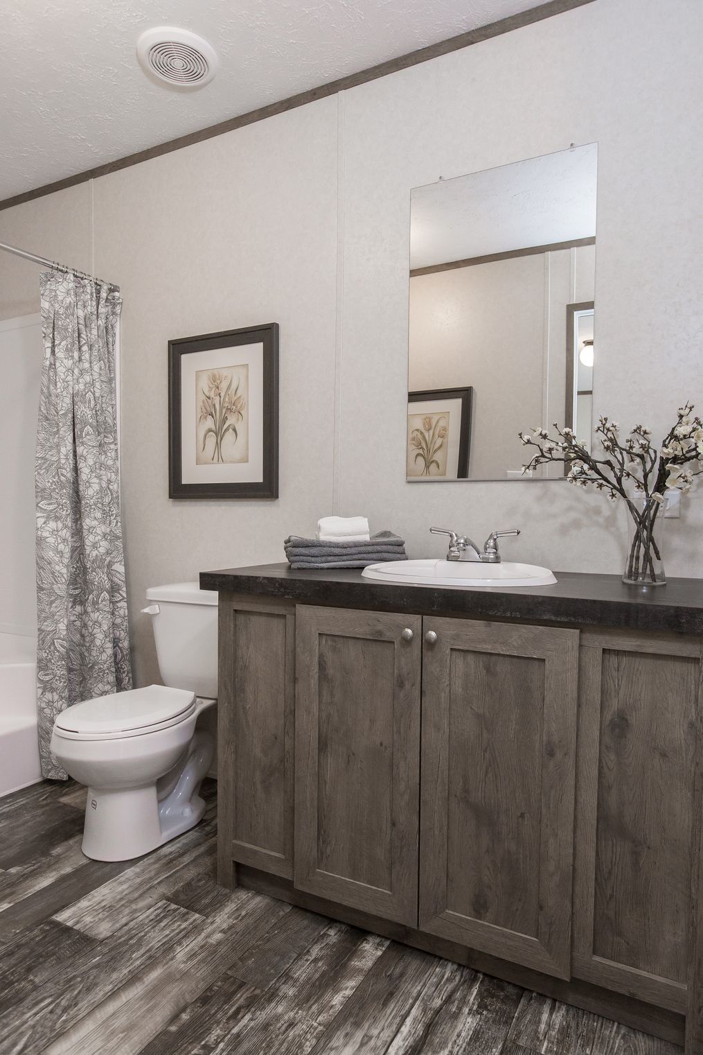 The THE NEW BREEZE I Master Bathroom. This Manufactured Mobile Home features 3 bedrooms and 2 baths.