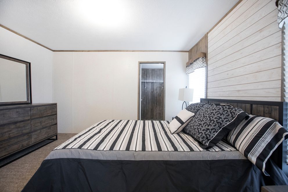 The THE SOUTHERN FARMHOUSE Primary Bathroom. This Manufactured Mobile Home features 3 bedrooms and 2 baths.