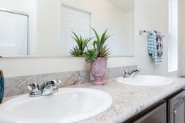 The CK661F Primary Bathroom. This Manufactured Mobile Home features 3 bedrooms and 2 baths.