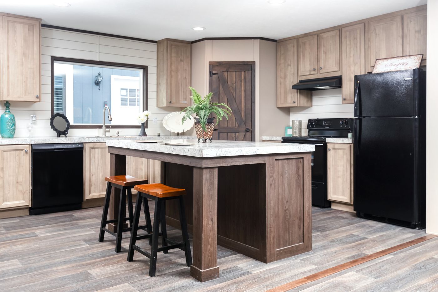 The PT 78 Kitchen. This Manufactured Mobile Home features 3 bedrooms and 2 baths.