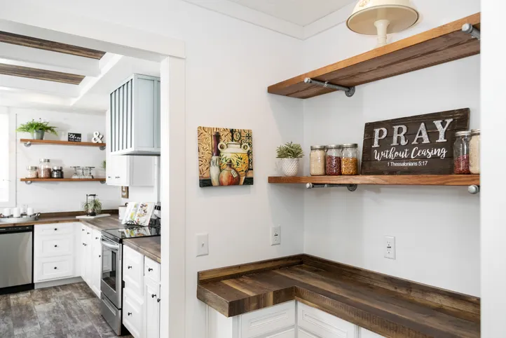 The THE LULABELLE Storage. This Manufactured Mobile Home features 4 bedrooms and 3 baths.