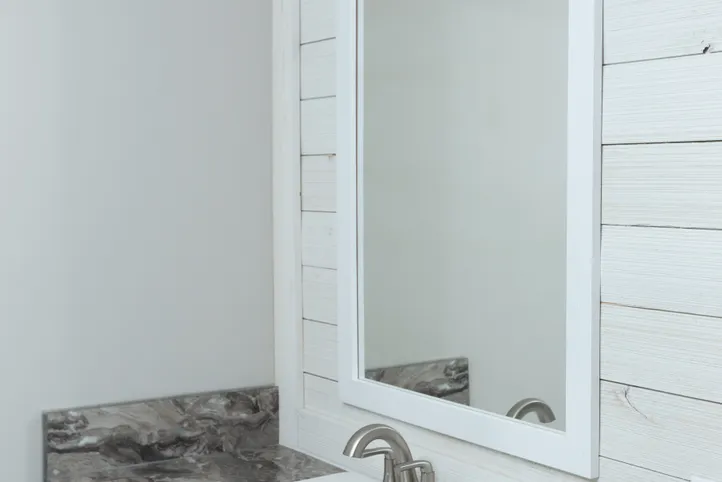 The THE FREEDOM BREEZE Primary Bathroom. This Manufactured Mobile Home features 3 bedrooms and 2 baths.