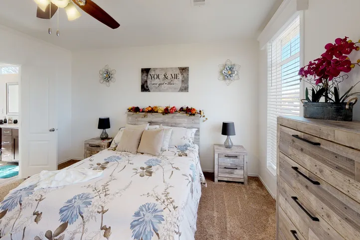 The SUM3068A Primary Bedroom. This Manufactured Mobile Home features 3 bedrooms and 2 baths.
