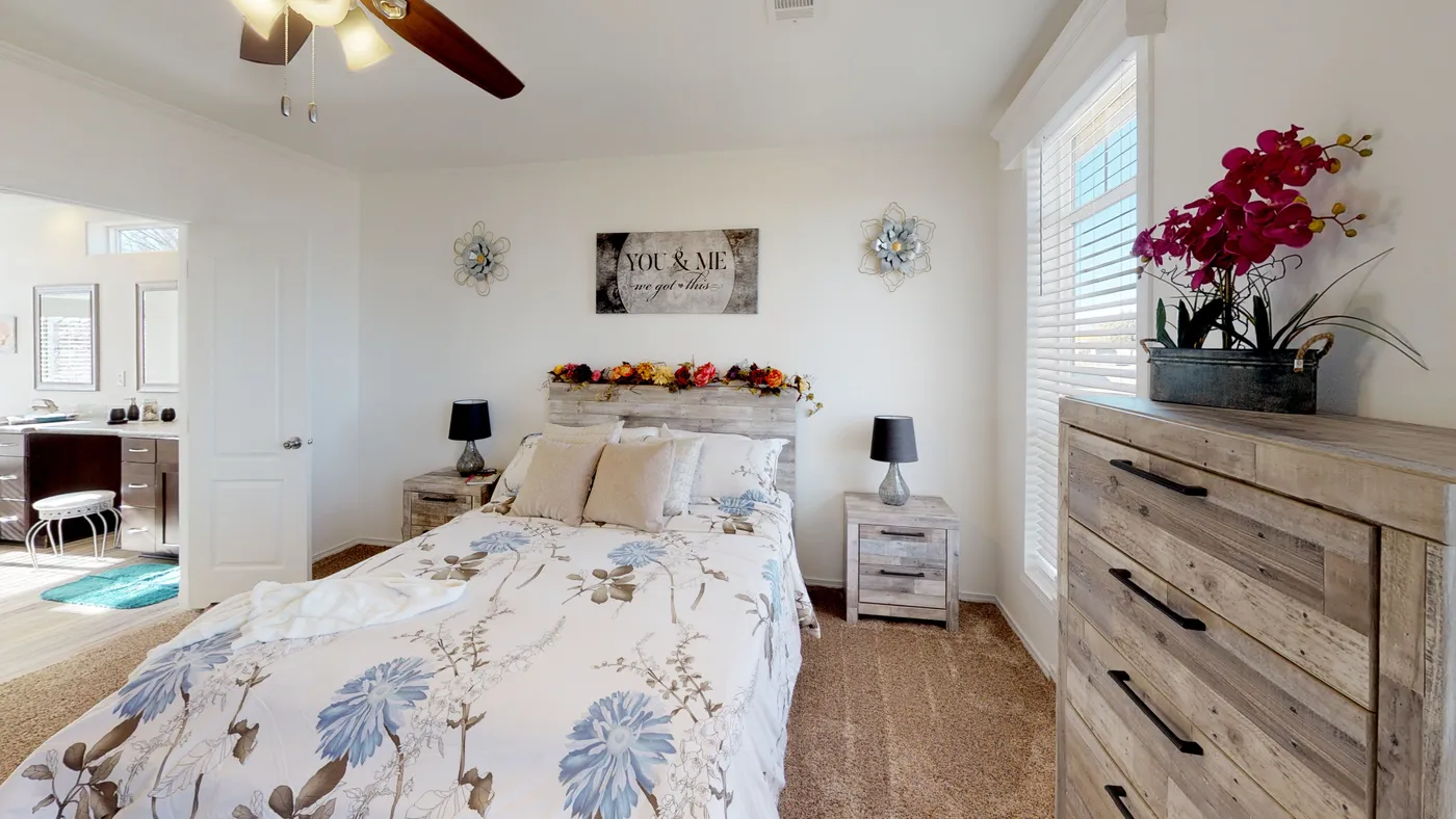 The SUM3068A Primary Bedroom. This Manufactured Mobile Home features 3 bedrooms and 2 baths.
