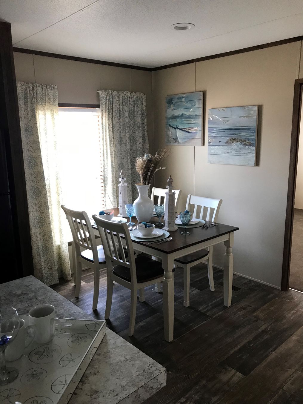 The THE ANNIVERSARY SPLASH Dining Room. This Manufactured Mobile Home features 3 bedrooms and 2 baths.