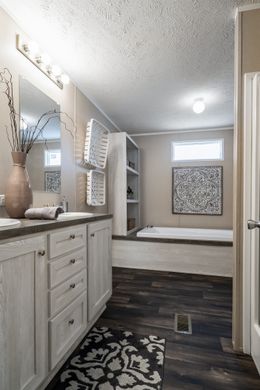 The ULTRA PRO 68 Living Room. This Manufactured Mobile Home features 4 bedrooms and 2 baths.