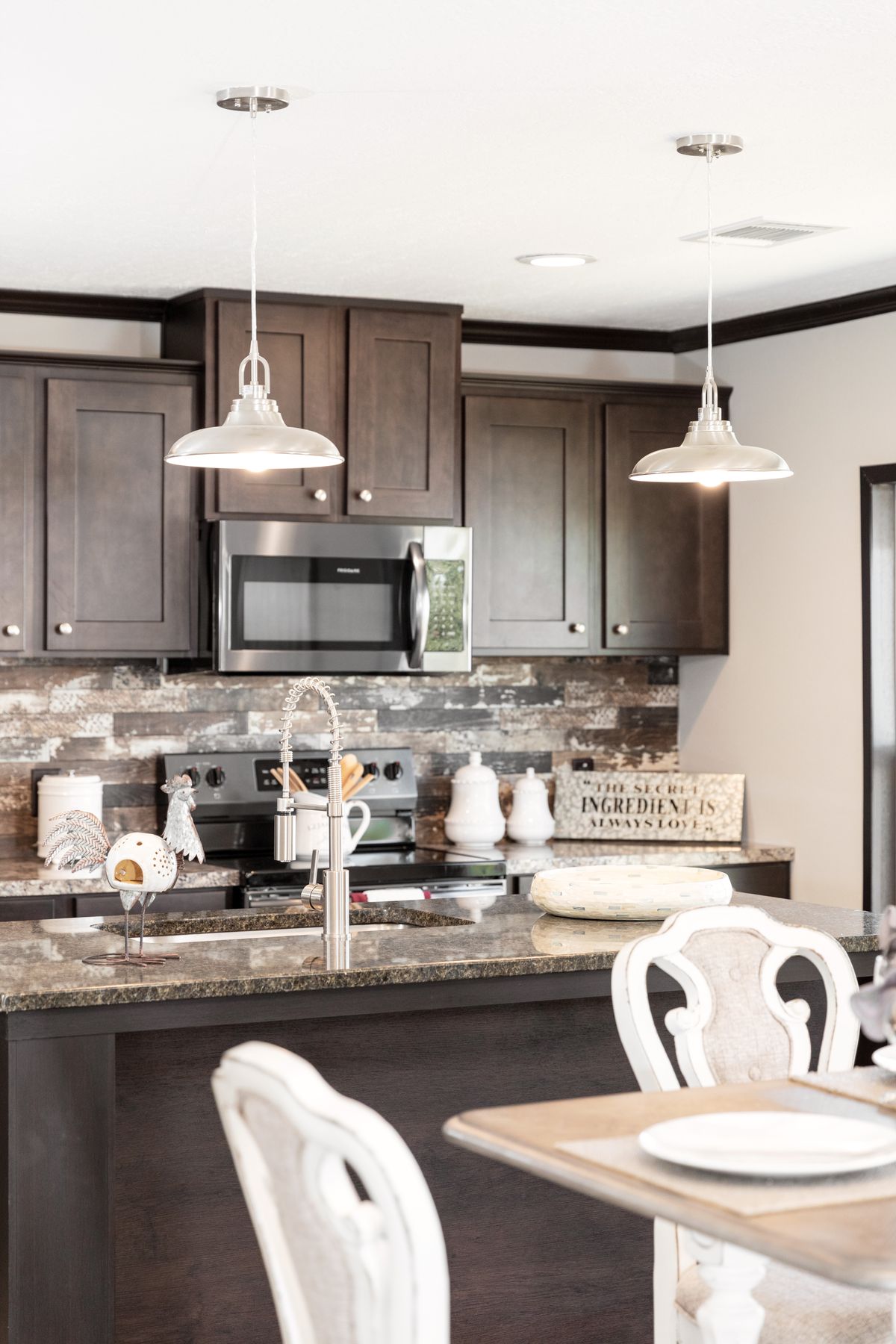 The THE FRANKLIN XL Kitchen. This Manufactured Mobile Home features 4 bedrooms and 2 baths.