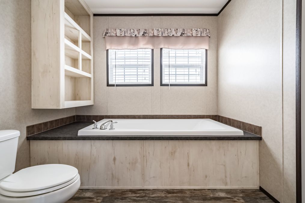 The THE TYRA Master Bathroom. This Manufactured Mobile Home features 4 bedrooms and 2 baths.