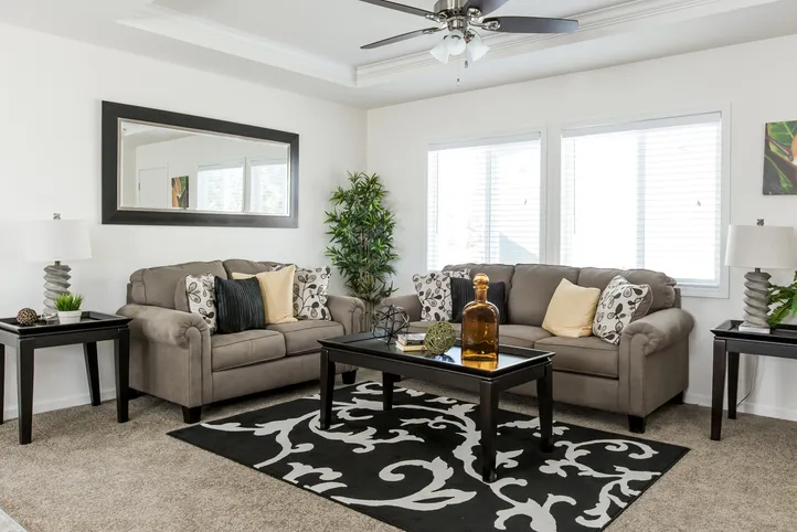The FAIRPOINT 24463A Living Room. This Manufactured Mobile Home features 3 bedrooms and 2 baths.