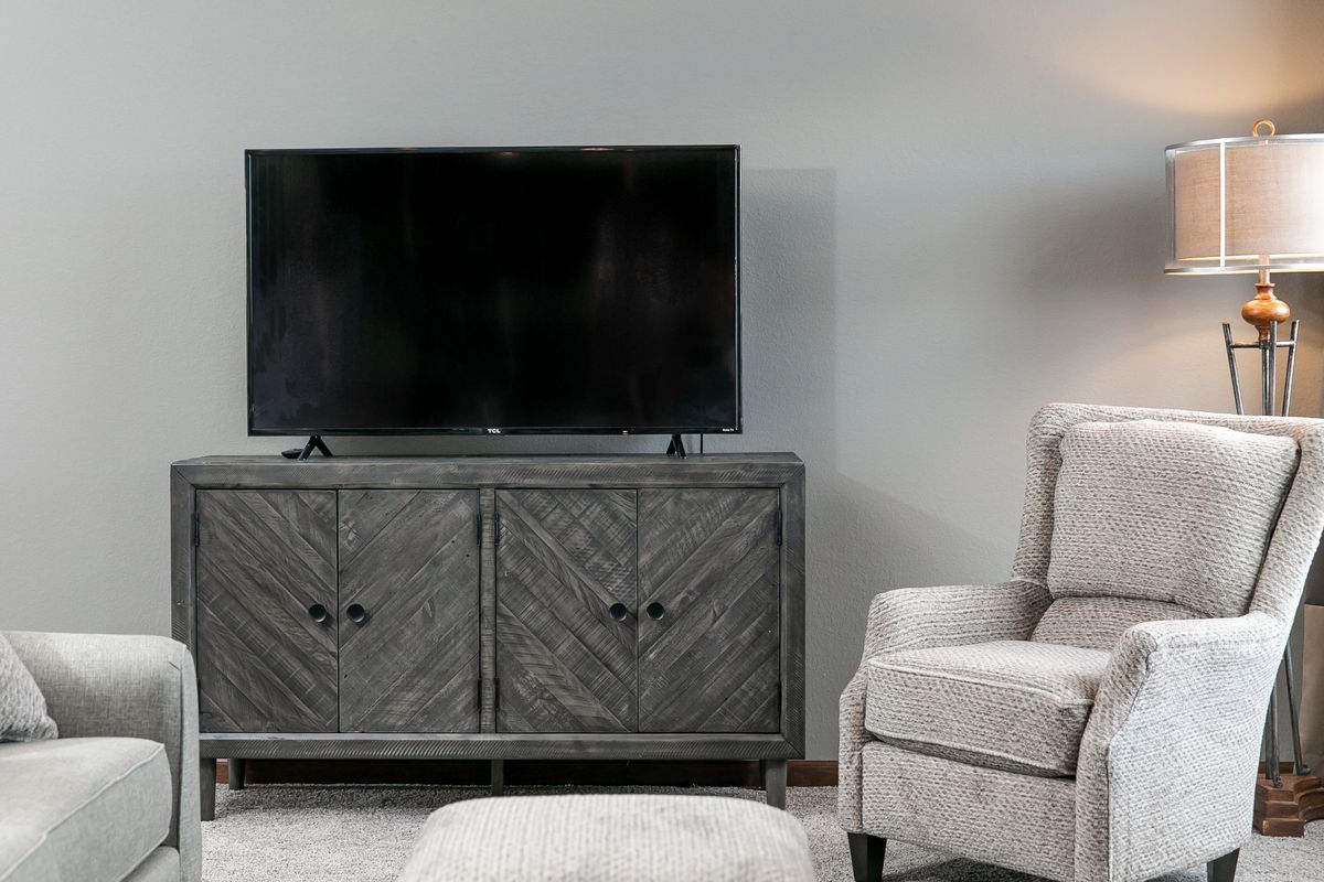 The FREEDOM 66 Living Room. This Manufactured Mobile Home features 3 bedrooms and 2 baths.