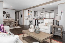 The FARM HOUSE BREEZE 72 Living Room. This Manufactured Mobile Home features 4 bedrooms and 2 baths.