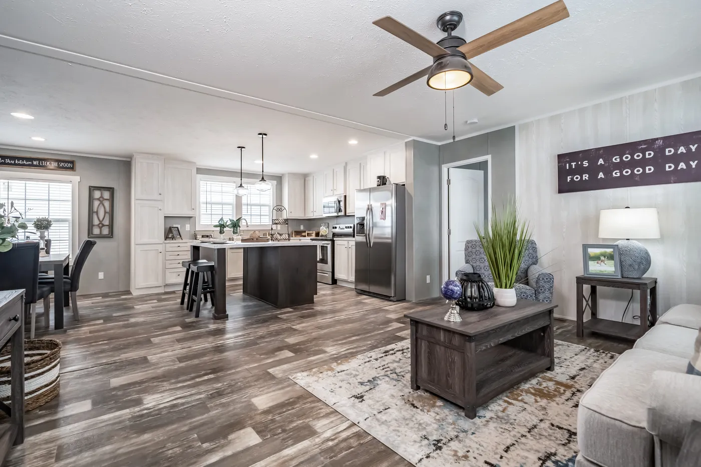 The ULTRA BREEZE 52 Living Room. This Manufactured Mobile Home features 3 bedrooms and 2 baths.