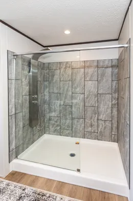 The THE HAMPTON BAY Primary Bathroom. This Manufactured Mobile Home features 3 bedrooms and 2 baths.
