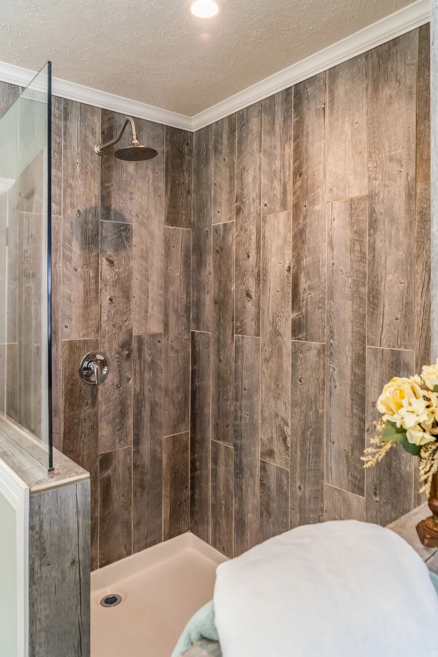 The THE INGRAM Primary Bathroom. This Manufactured Mobile Home features 3 bedrooms and 2 baths.