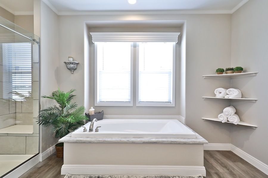 The EDGEWOOD Primary Bathroom. This Manufactured Mobile Home features 3 bedrooms and 2 baths.