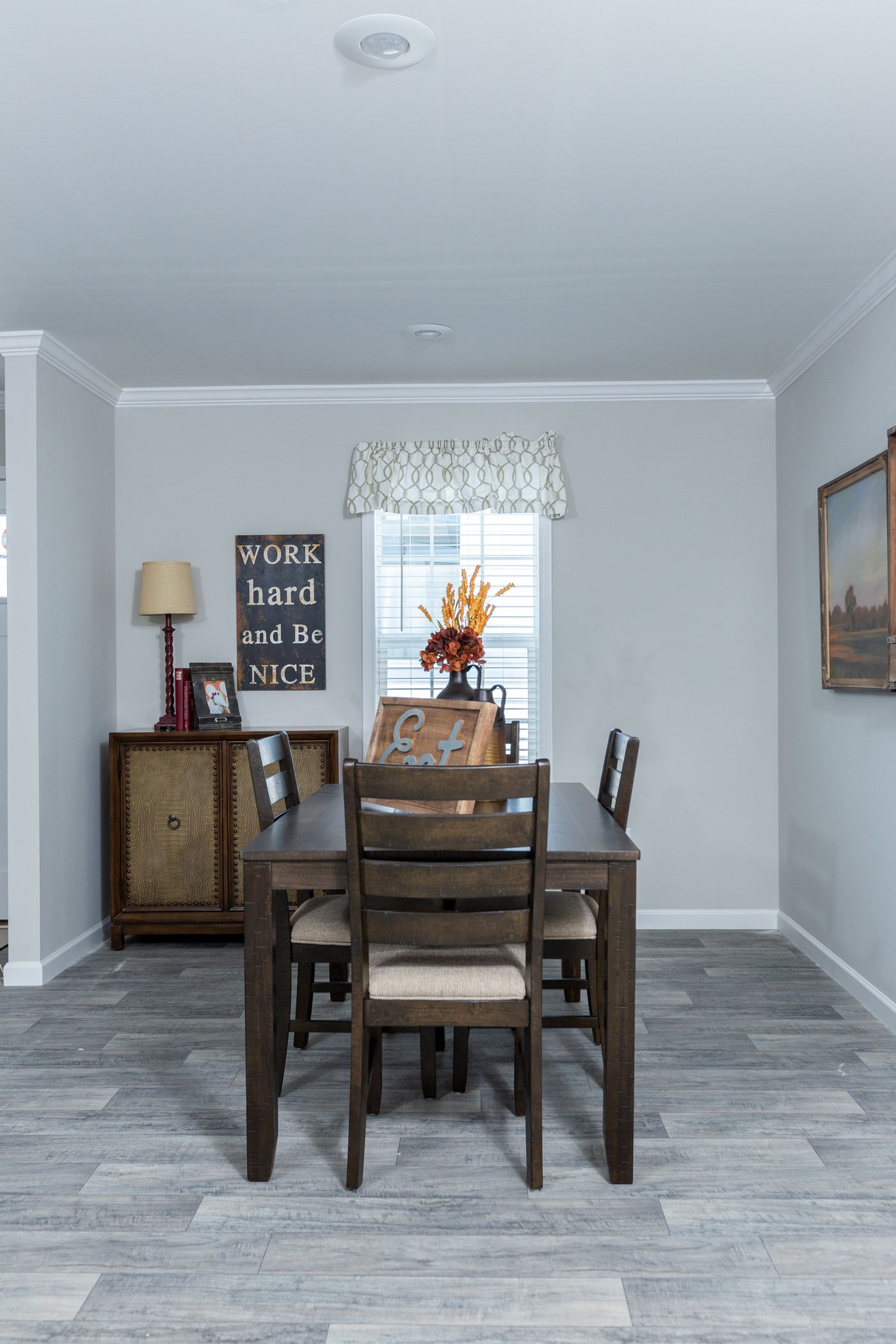 The THE FREEDOM BREEZE Dining Area. This Manufactured Mobile Home features 3 bedrooms and 2 baths.