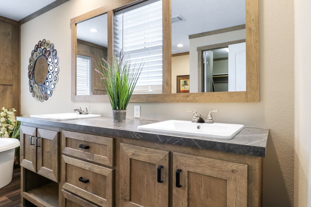 The AMELIA Master Bathroom. This Manufactured Mobile Home features 4 bedrooms and 2 baths.