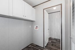 The THE SOCIAL 76 Utility Room. This Manufactured Mobile Home features 3 bedrooms and 2 baths.