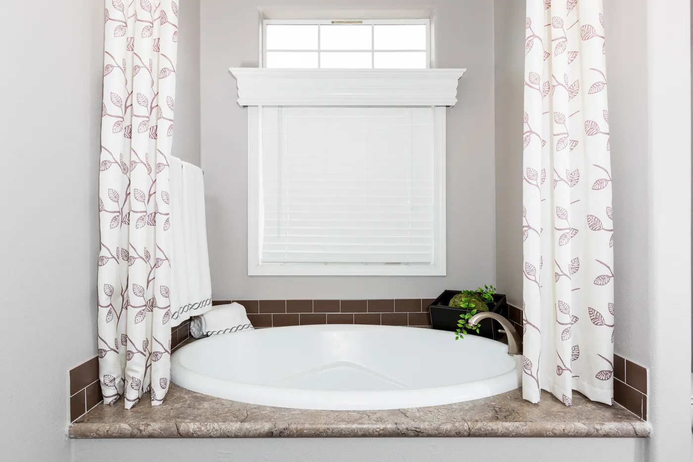 The ENCHANTMENT 3070A Guest Bathroom. This Manufactured Mobile Home features 3 bedrooms and 2 baths.