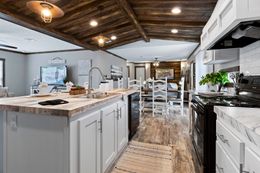 The THE MAVERICK Kitchen. This Manufactured Mobile Home features 4 bedrooms and 2 baths.