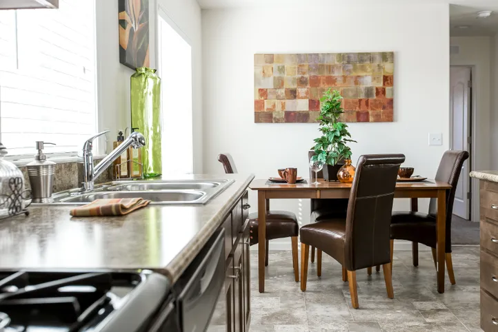The FAIRPOINT 24463A Dining Area. This Manufactured Mobile Home features 3 bedrooms and 2 baths.