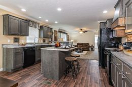 The WINCHESTER FLEX Kitchen. This Manufactured Mobile Home features 4 bedrooms and 2 baths.