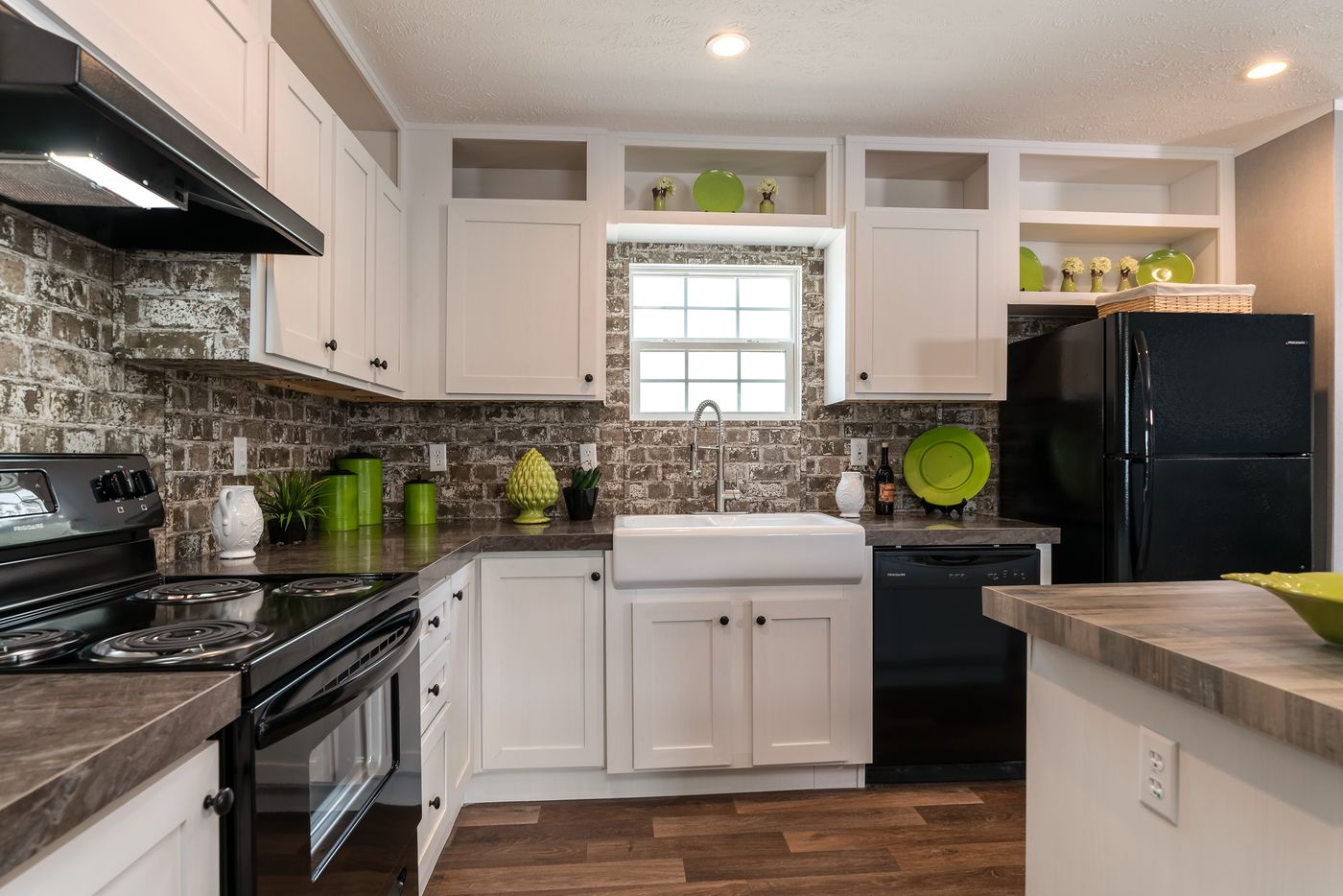 The TRADITION 56D Kitchen. This Manufactured Mobile Home features 3 bedrooms and 2 baths.