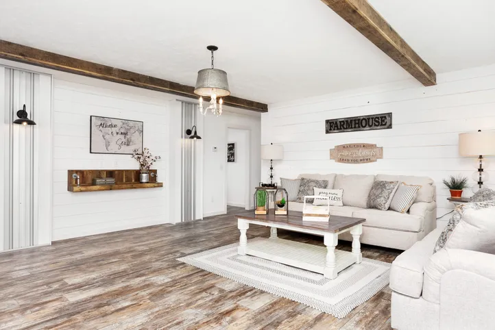 The THE LULABELLE Living Room. This Manufactured Mobile Home features 4 bedrooms and 3 baths.