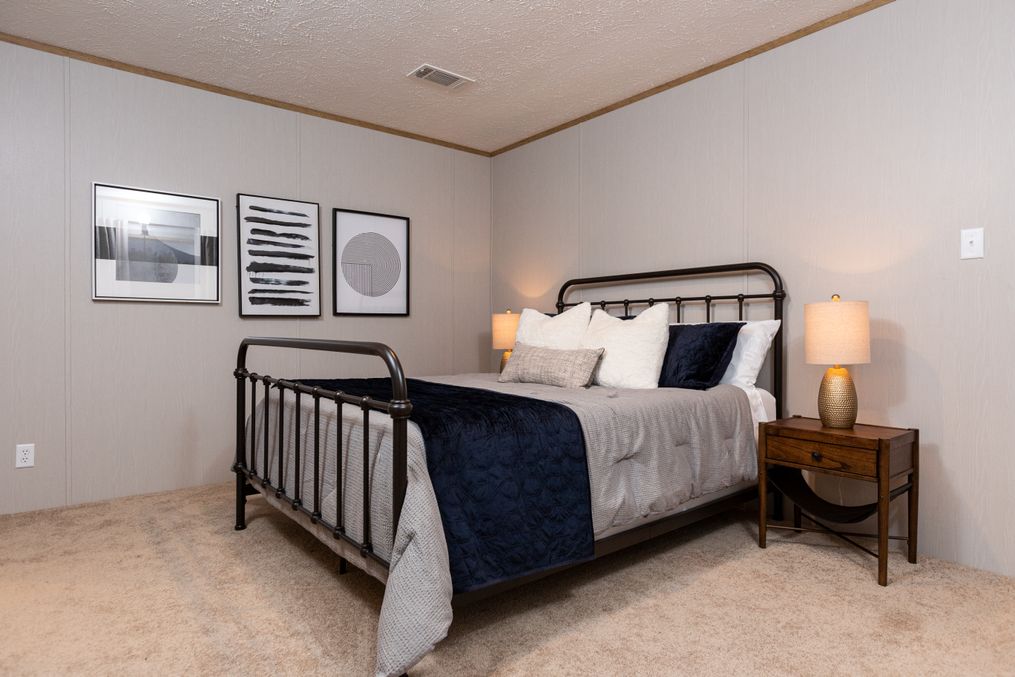 The SYDNEY Master Bedroom. This Manufactured Mobile Home features 3 bedrooms and 2 baths.