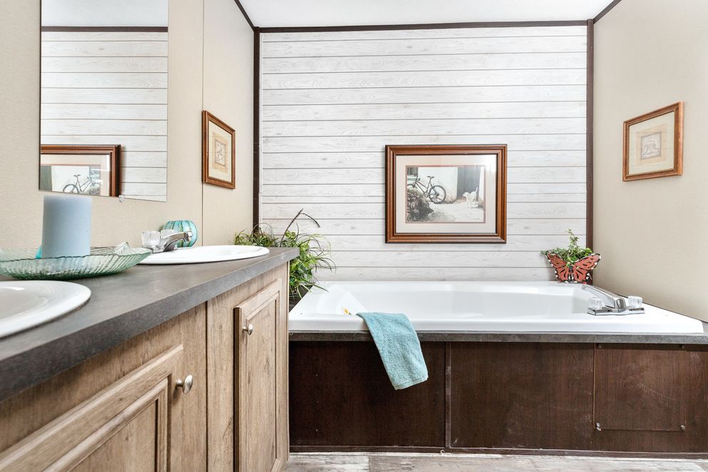 The THE SHERMAN Primary Bathroom. This Manufactured Mobile Home features 3 bedrooms and 2 baths.