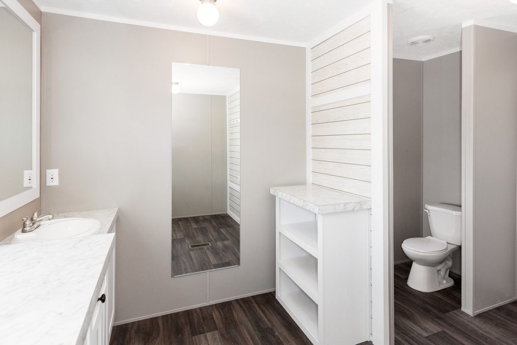 The ISLAND BREEZE Primary Bathroom. This Manufactured Mobile Home features 3 bedrooms and 2 baths.