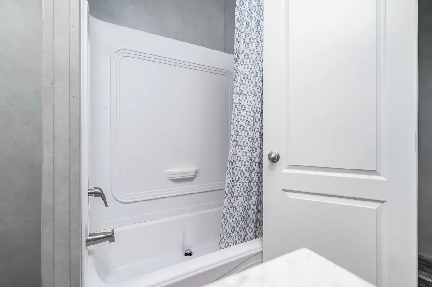 The ULTRA BREEZE 52 Guest Bathroom. This Manufactured Mobile Home features 3 bedrooms and 2 baths.