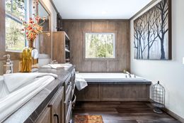 The COUNTRY COTTAGE Master Bathroom. This Manufactured Mobile Home features 3 bedrooms and 2 baths.