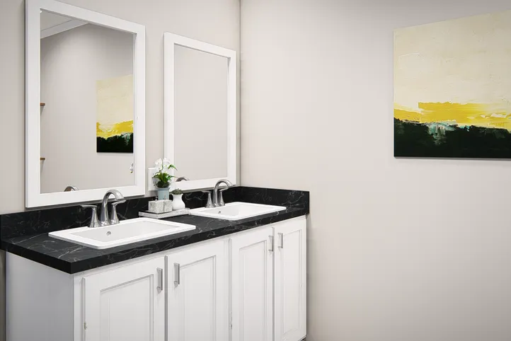 The THE VALHALLA Guest Bathroom. This Manufactured Mobile Home features 3 bedrooms and 2 baths.