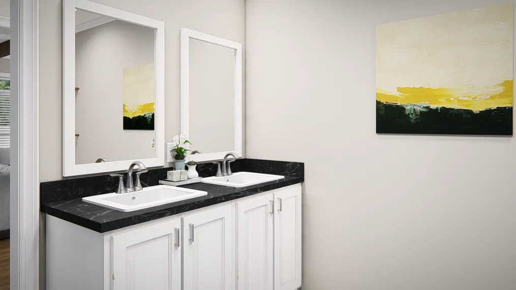 The THE VALHALLA Guest Bathroom. This Manufactured Mobile Home features 3 bedrooms and 2 baths.