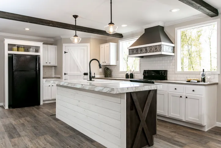 The FREEDOM FARM HOUSE  32X60 Kitchen. This Manufactured Mobile Home features 3 bedrooms and 2 baths.