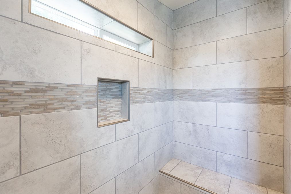 The GE662K Primary Bathroom. This Manufactured Mobile Home features 4 bedrooms and 2 baths.