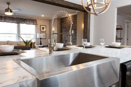 The THE FREEDOM SOHO Kitchen. This Manufactured Mobile Home features 3 bedrooms and 2 baths.