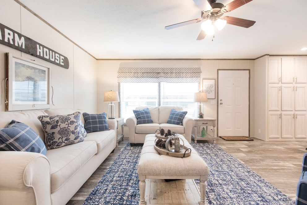 The THE SOUTHERN FARMHOUSE Living Room. This Manufactured Mobile Home features 3 bedrooms and 2 baths.