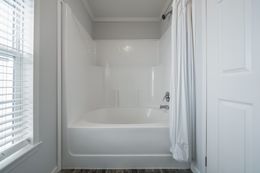 The THE LEAHY Guest Bathroom. This Manufactured Mobile Home features 4 bedrooms and 2 baths.