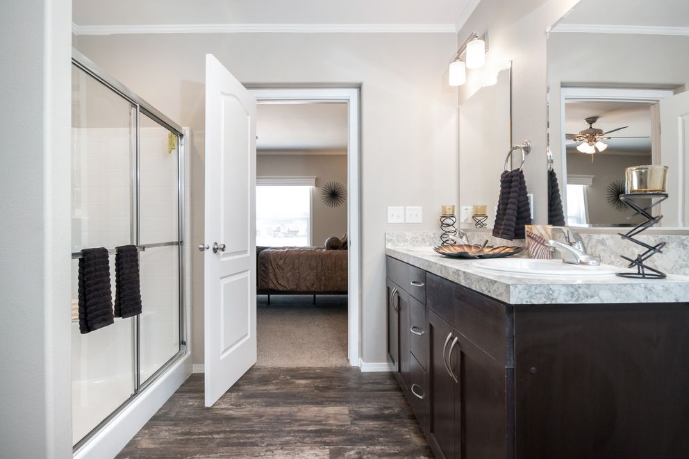 The K3076B Primary Bathroom. This Manufactured Mobile Home features 4 bedrooms and 2 baths.