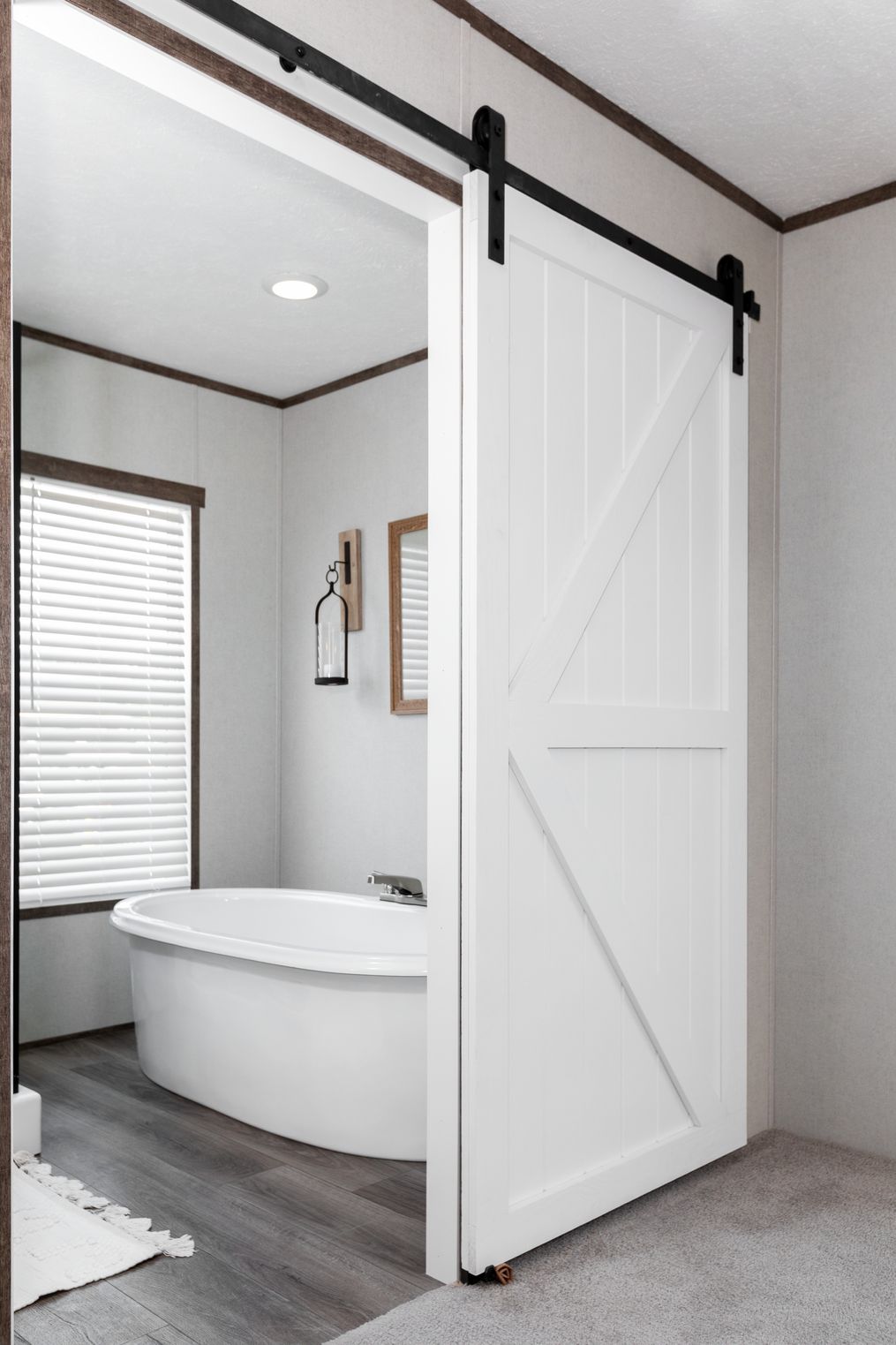 The PLATINUM ANNIVERSARY Master Bathroom. This Manufactured Mobile Home features 3 bedrooms and 2 baths.