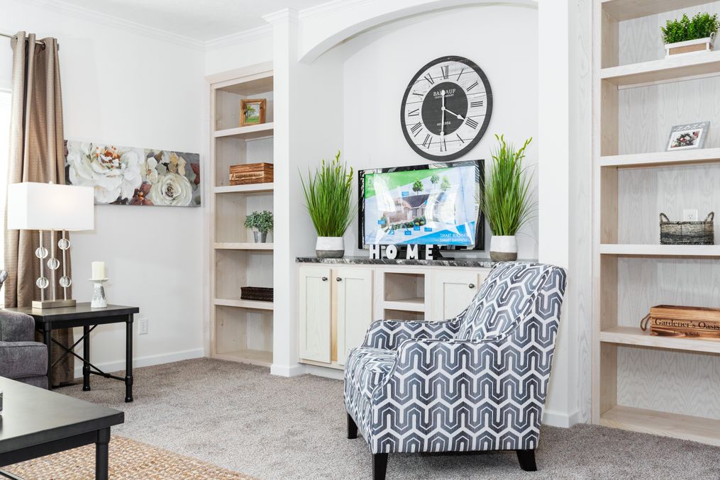 The 2095 HERITAGE Living Room. This Manufactured Mobile Home features 3 bedrooms and 2 baths.