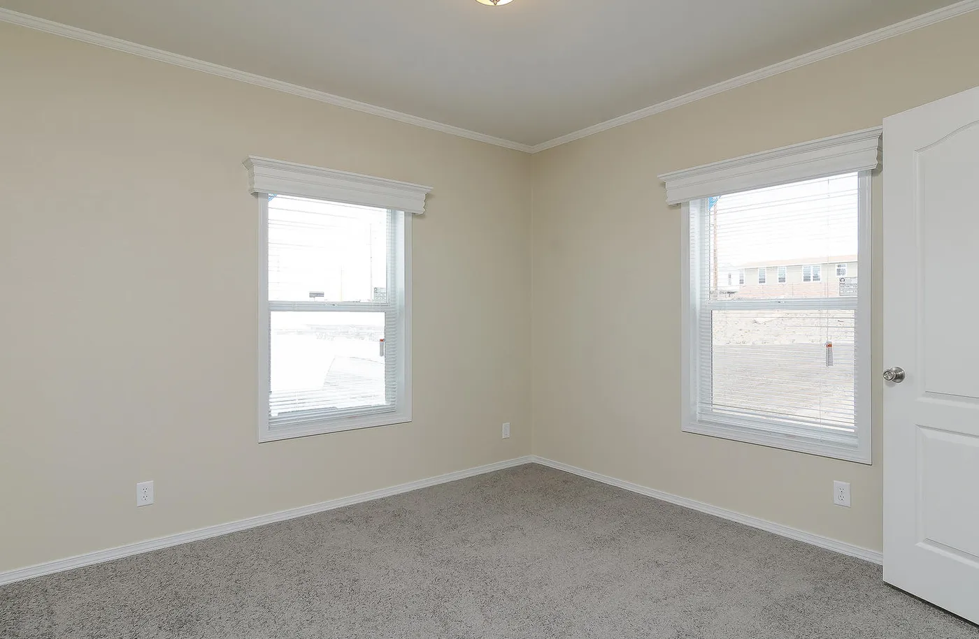 The K3076A Bedroom. This Manufactured Mobile Home features 4 bedrooms and 2 baths.