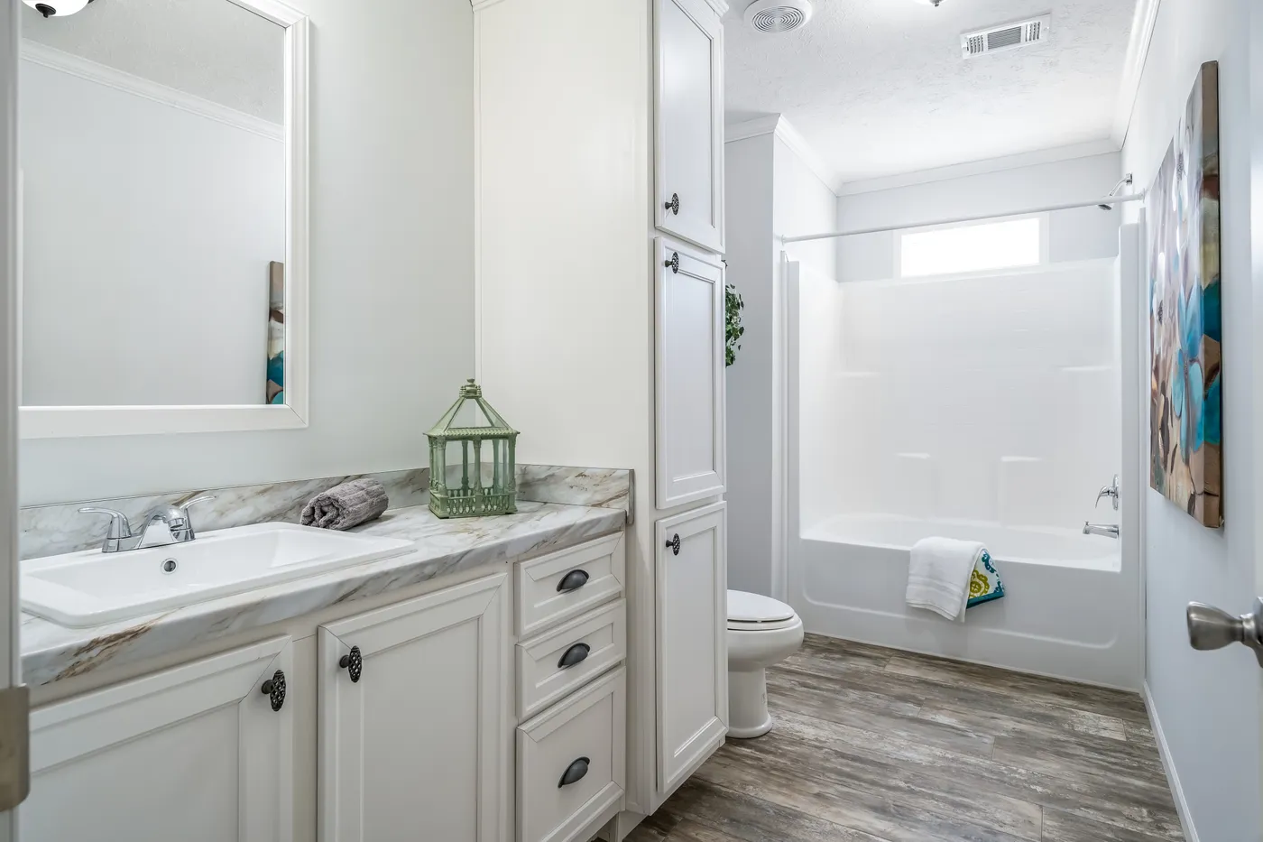 The THE INGRAM Primary Bathroom. This Manufactured Mobile Home features 3 bedrooms and 2 baths.