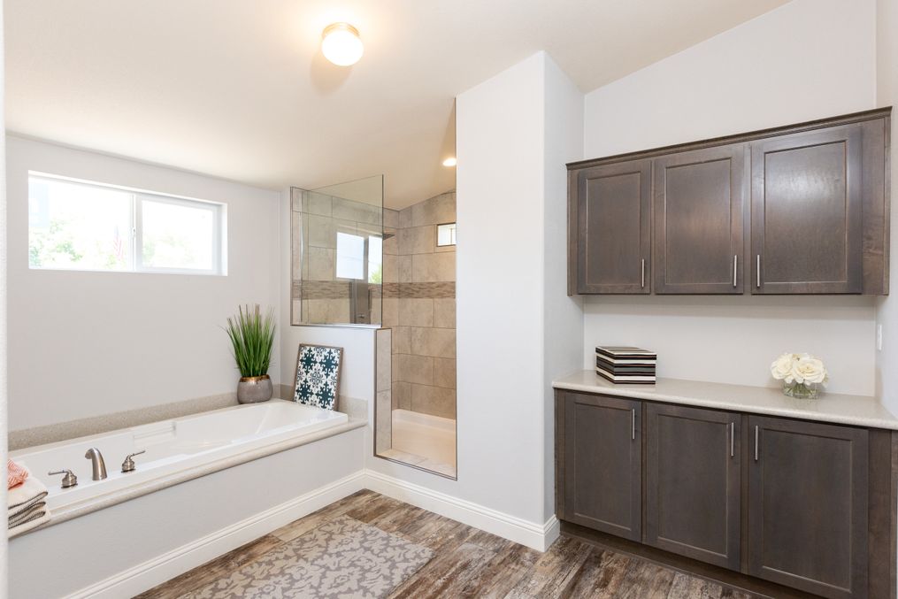 The GE662K Primary Bathroom. This Manufactured Mobile Home features 4 bedrooms and 2 baths.