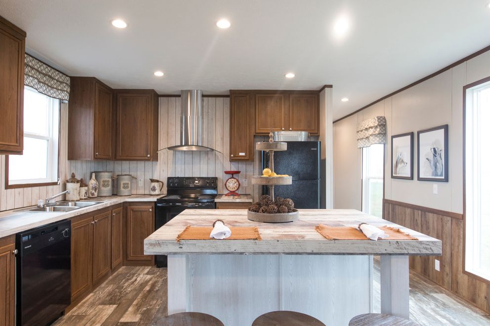 The THE LODGE Kitchen. This Manufactured Mobile Home features 2 bedrooms and 2 baths.