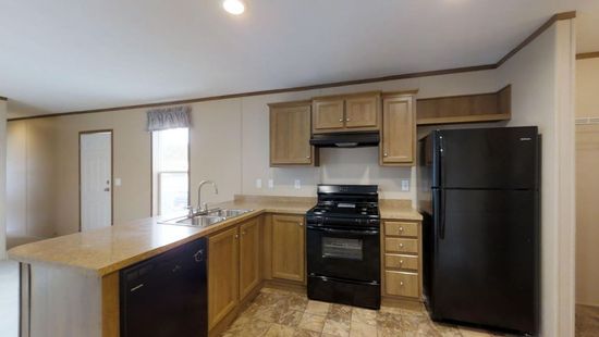 The AMBER Kitchen. This Manufactured Mobile Home features 3 bedrooms and 2 baths.