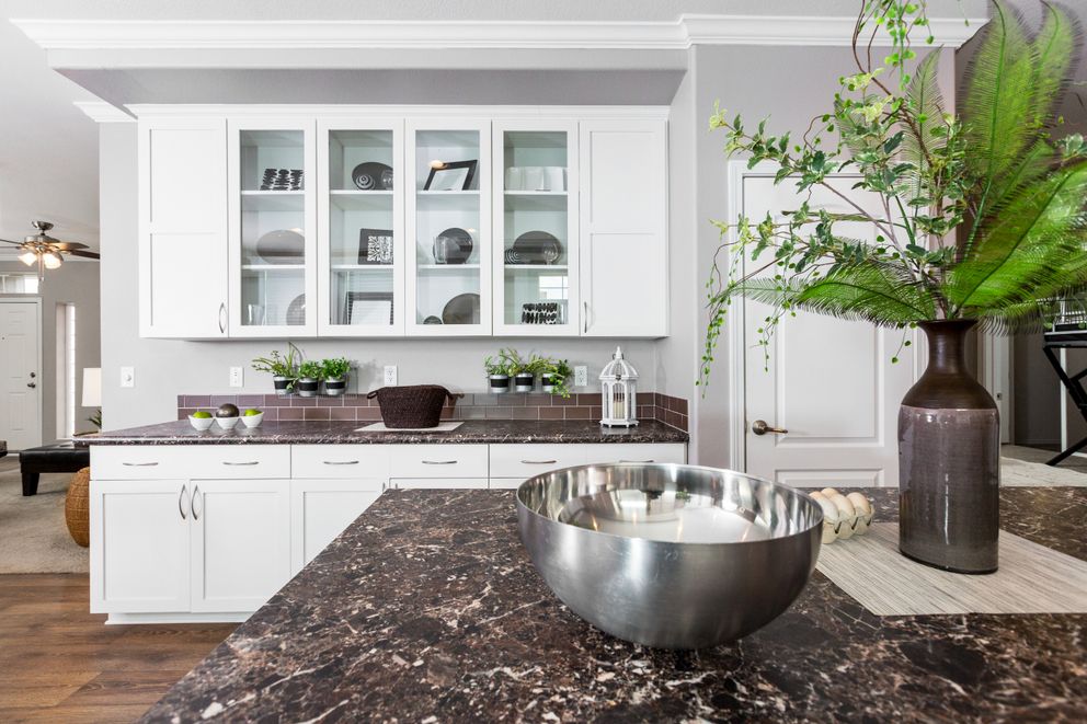 The ENCHANTMENT 3070A Kitchen. This Manufactured Mobile Home features 3 bedrooms and 2 baths.