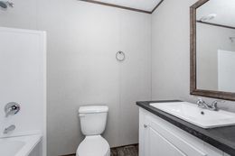 The BLAZER 76 4A Primary Bathroom. This Manufactured Mobile Home features 4 bedrooms and 2 baths.